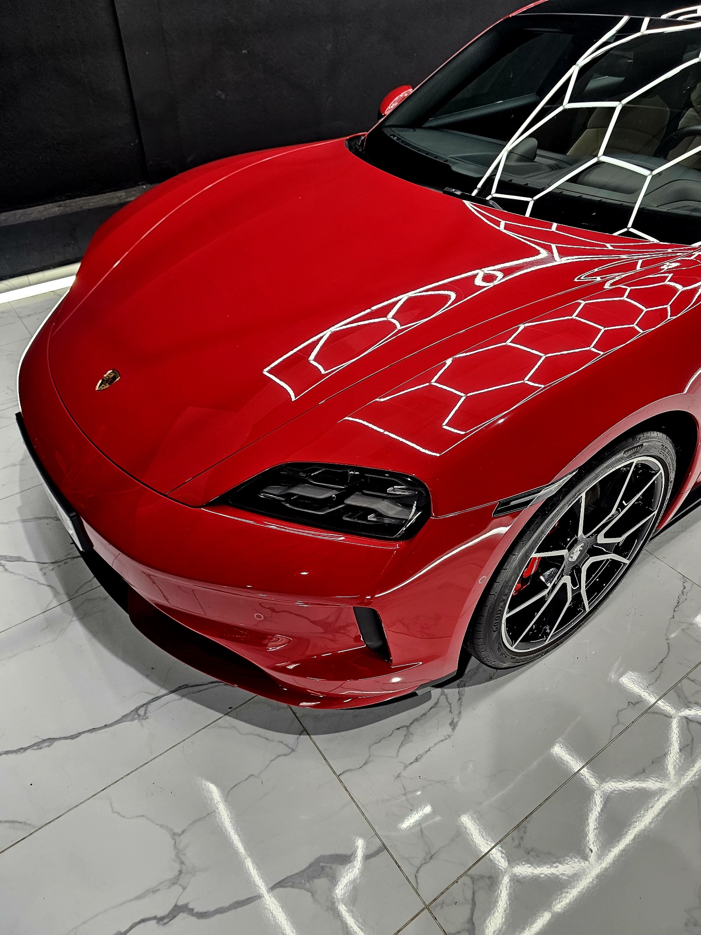 Porsche Taycan in red after ceramic coating